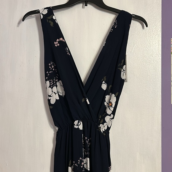 Women’s medium jumpsuit. Navy with floral print. New with tags still attached. - Picture 2 of 5